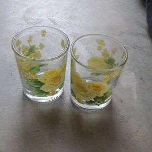 A pair of Glass T-Lite Candle Holders